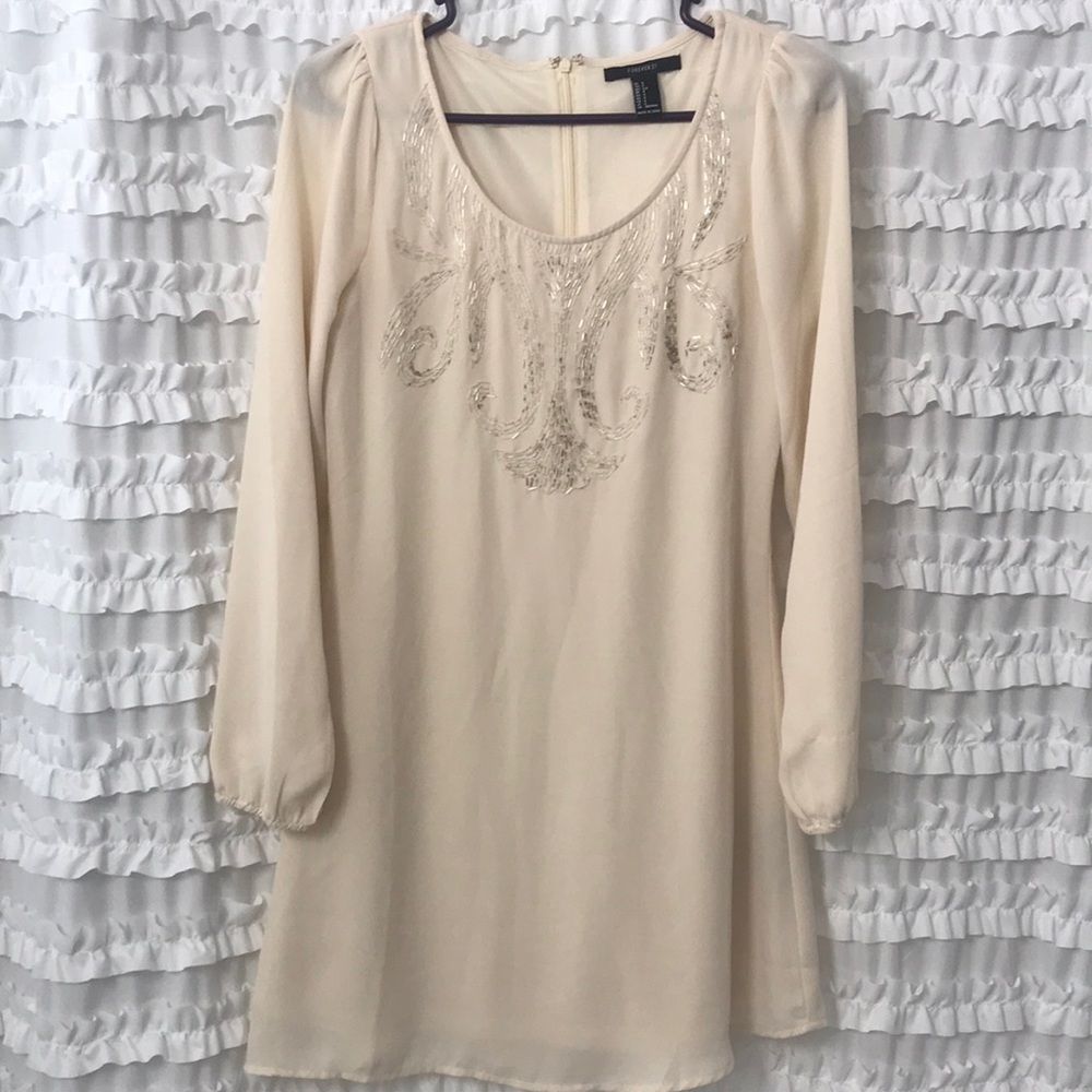 Cream dress with beaded embellishment